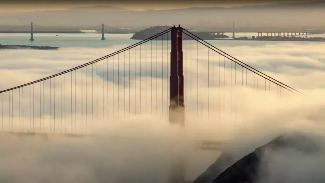 Shot of the 金门大桥 as fog envelops it.